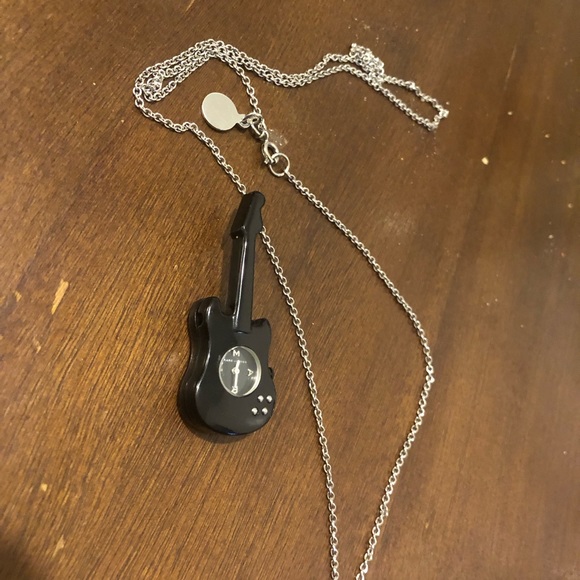 Marc Jacobs pear watch, the guitar is a free add on. Pear just needs battery. - Picture 2 of 2
